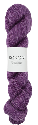 A Dark Purple, the colours name is Byzantium, 100g skein of KOKON Yarn Merino Linen on a white background